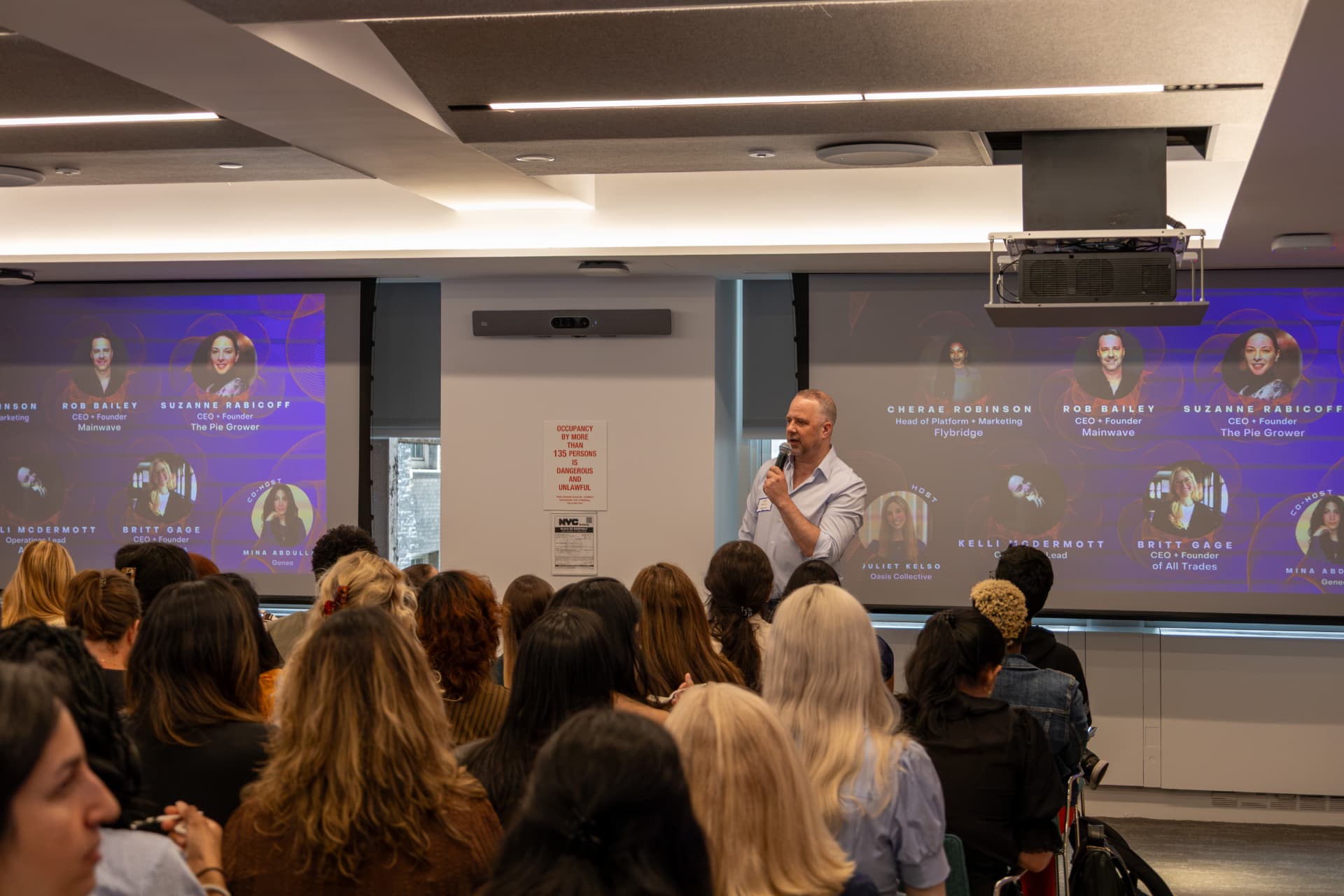 Audience at a Women in AI Pitch Competition event
